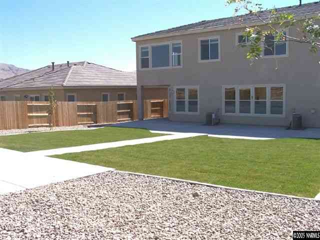 10535 Kenai Drive Reno, NV 89521 - Photo 8 of 9 a view of a house with a yard and sitting area