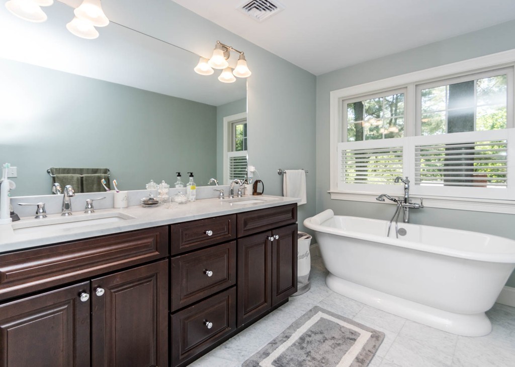80 Lawton Road Needham, MA 02492 - Photo 20 of 30 a spacious bathroom with a tub double sink and mirror