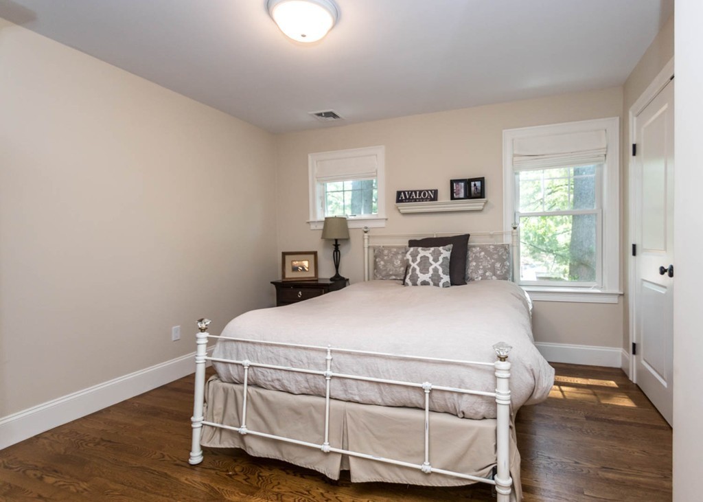 80 Lawton Road Needham, MA 02492 - Photo 21 of 30 a bedroom with a bed and wooden floor