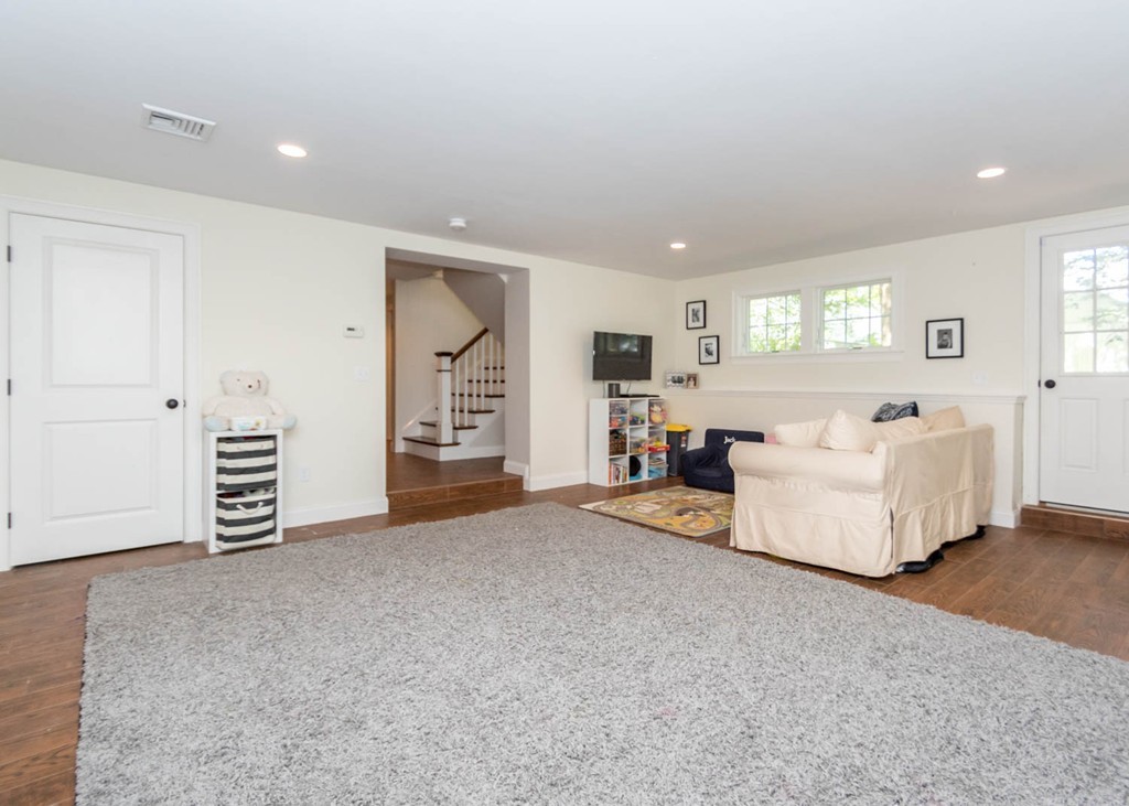 80 Lawton Road Needham, MA 02492 - Photo 26 of 30 a view of a livingroom with furniture and windows