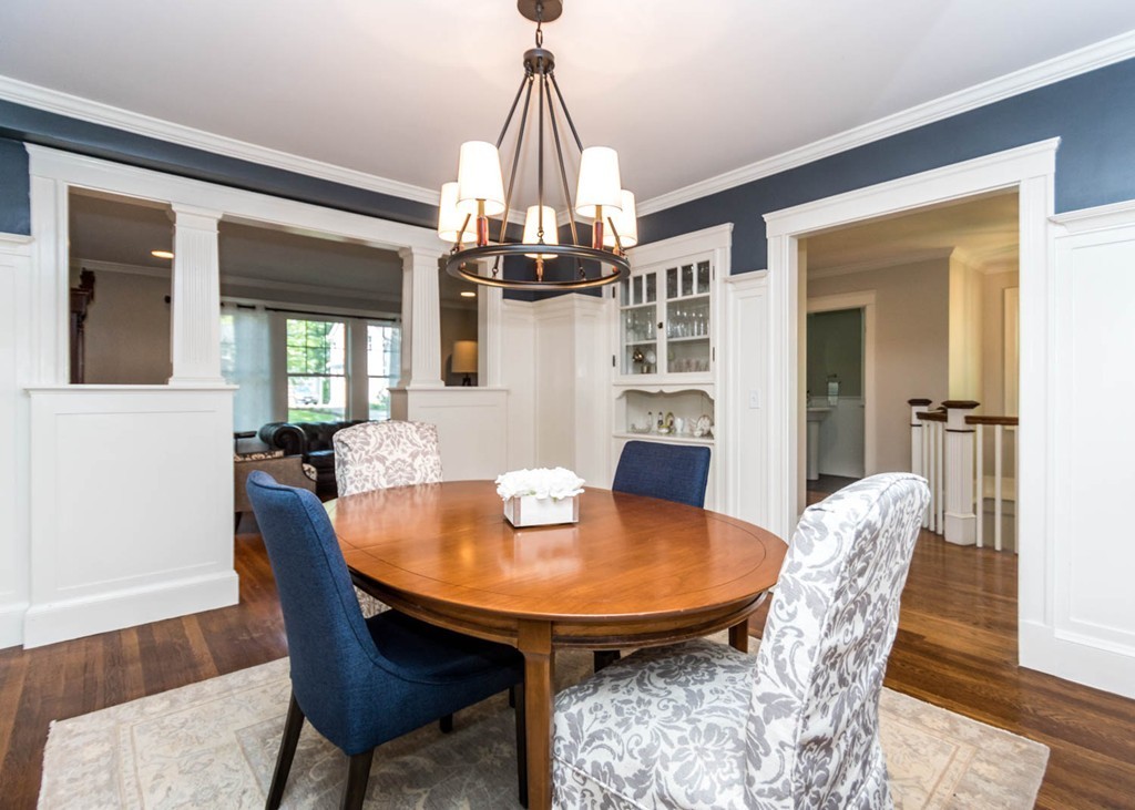 80 Lawton Road Needham, MA 02492 - Photo 10 of 30 a dining room with furniture a chandelier and wooden floor