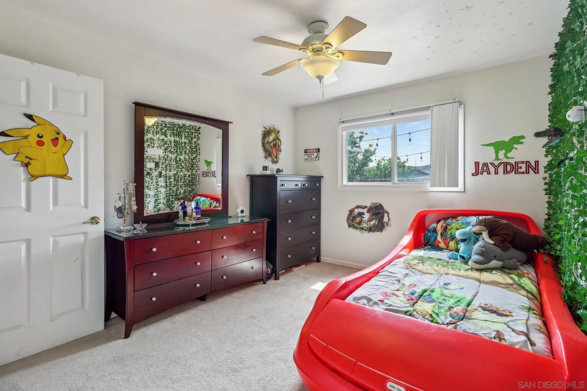9932 Settle Road Santee, CA 92071 - Photo 34 of 53 a bedroom with a bed and a dresser in it