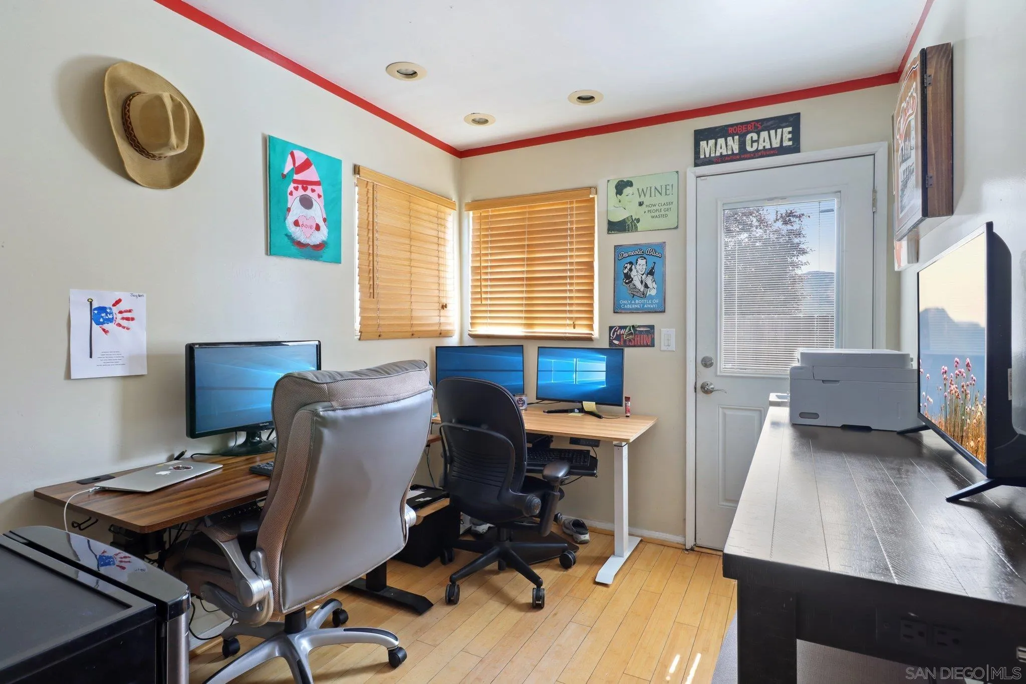 9932 Settle Road Santee, CA 92071 - Photo 36 of 53 a view of a workspace with furniture and a window