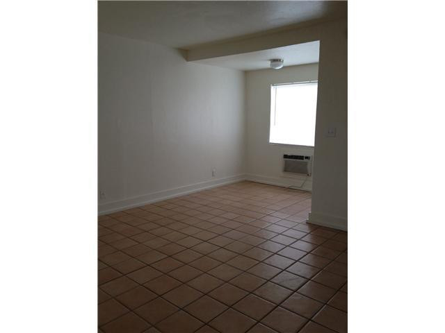 519 North Birch Road, Unit 12 Fort Lauderdale, FL 33304 - Photo 3 of 9 a view of a room that has a window in it