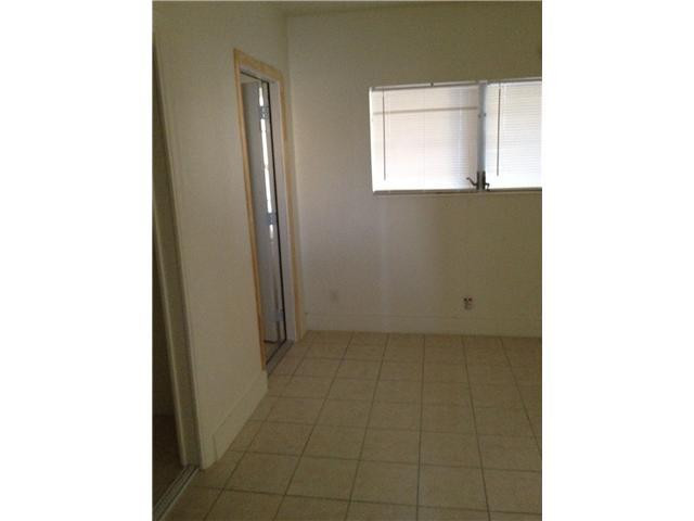 519 North Birch Road, Unit 12 Fort Lauderdale, FL 33304 - Photo 6 of 9 a view of a utility room with a window