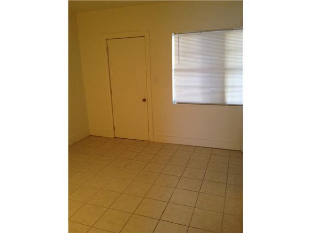 519 North Birch Road, Unit 12 Fort Lauderdale, FL 33304 - Photo 9 of 9 a view of an empty room with a bathroom