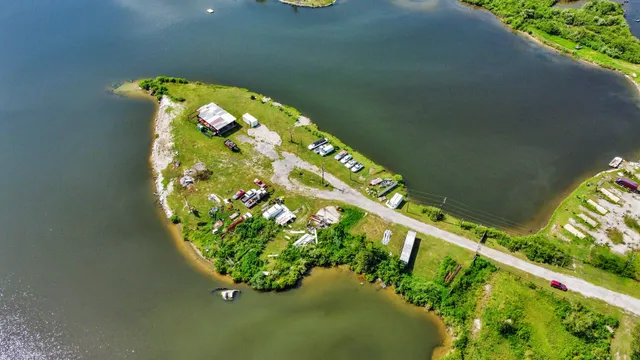 a view of a wooden floor in a corridor
