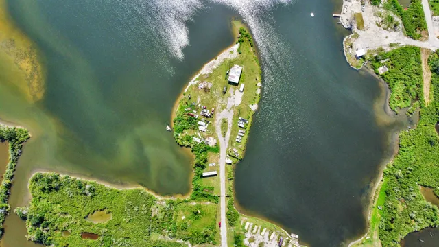 a view of a table and chairs in the garden