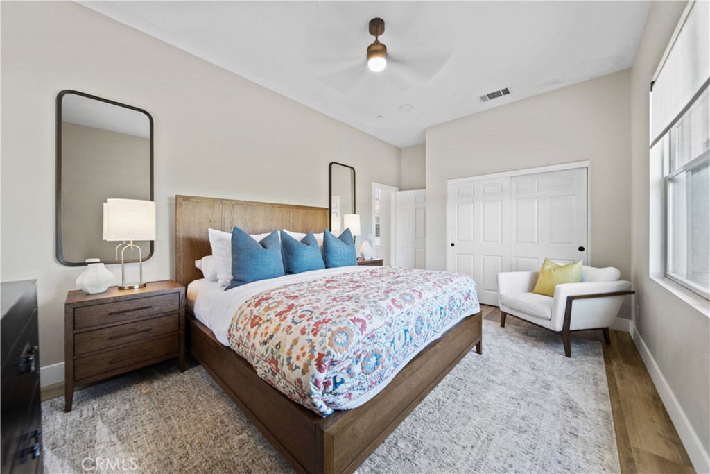 169 Mission Oaks Road Fallbrook, CA 92028 - Photo 29 of 35 a bedroom with a bed couch and window