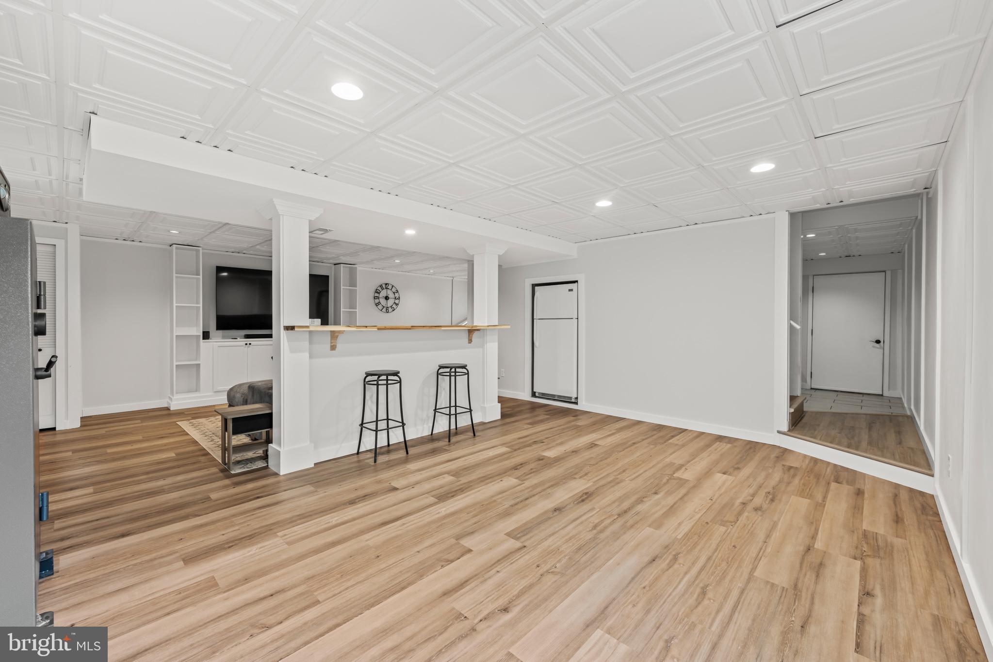 240 Boxley Lane Orange, VA 22960 - Photo 31 of 46 a large room with wooden floor and windows