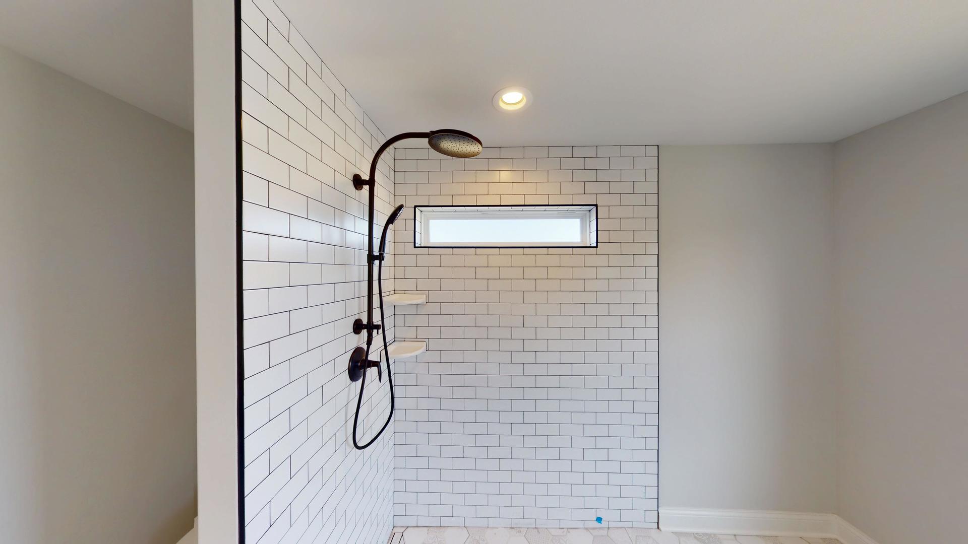 118 Cache Isle Circle Channahon, IL 60410 - Photo 32 of 32 a bathroom with a shower