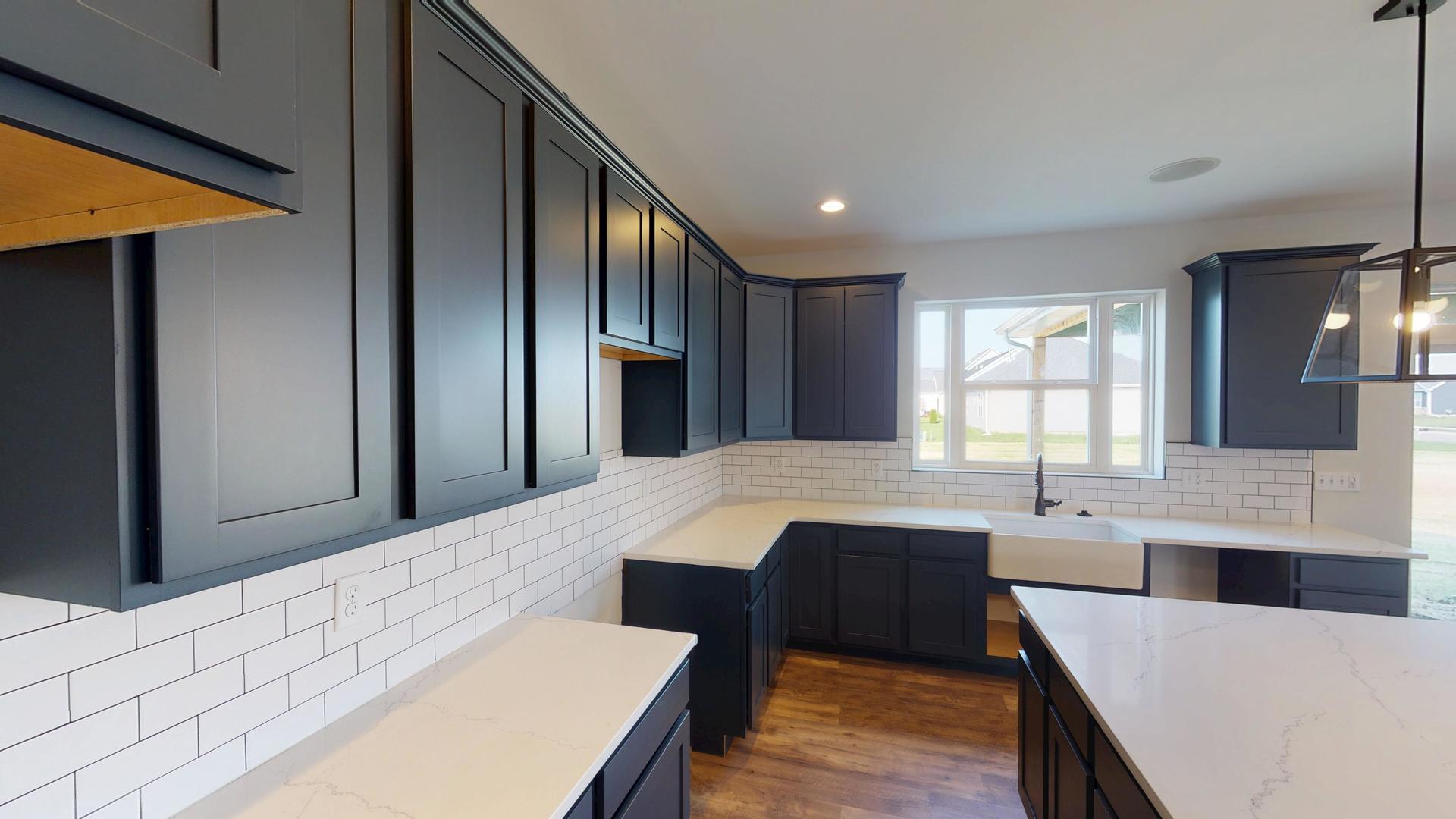 118 Cache Isle Circle Channahon, IL 60410 - Photo 10 of 32 a large kitchen with a table and chairs