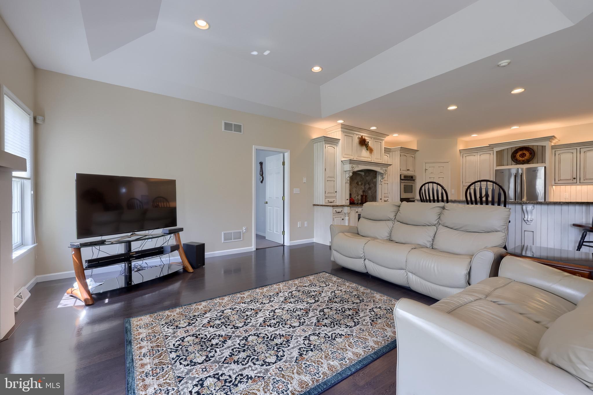 890 Fishburn Road Hershey, PA 17033 - Photo 22 of 103 a living room with furniture and a flat screen tv