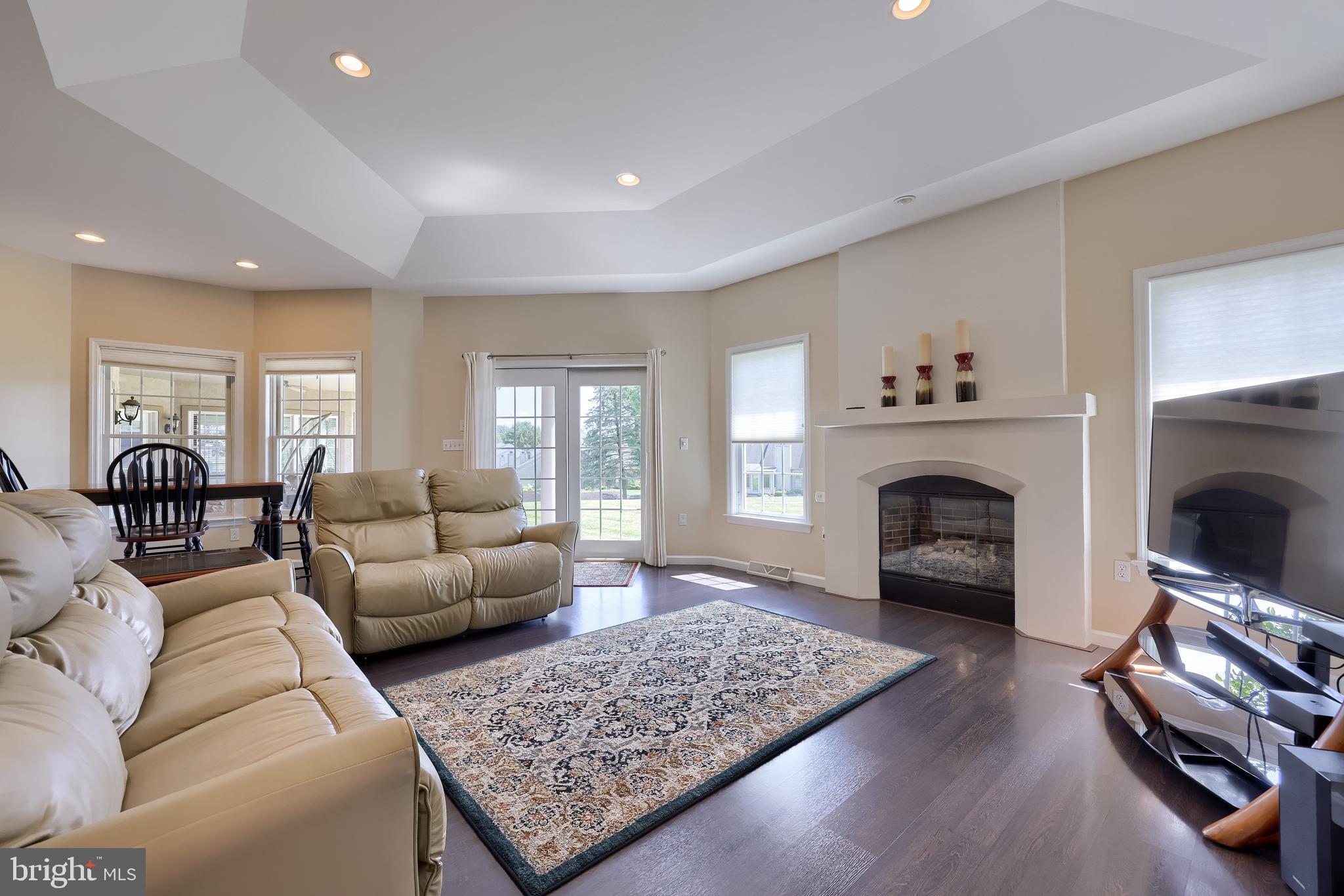 890 Fishburn Road Hershey, PA 17033 - Photo 24 of 103 a living room with furniture and a fireplace