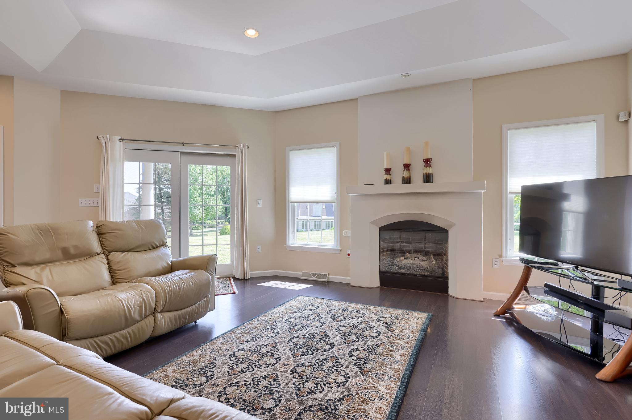 890 Fishburn Road Hershey, PA 17033 - Photo 25 of 103 a living room with furniture and a fireplace