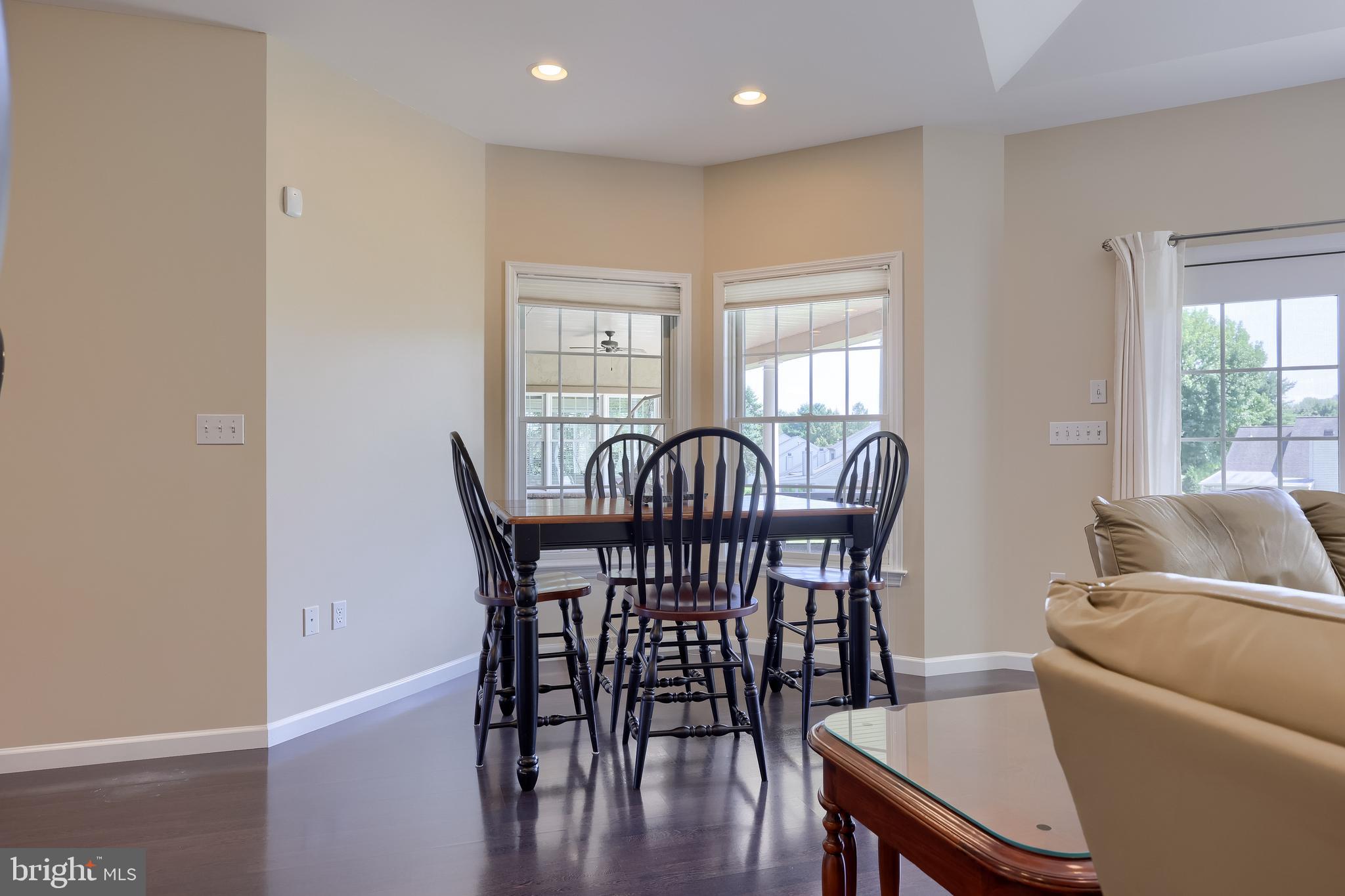 890 Fishburn Road Hershey, PA 17033 - Photo 28 of 103 a view of a dining room with furniture window and wooden floor