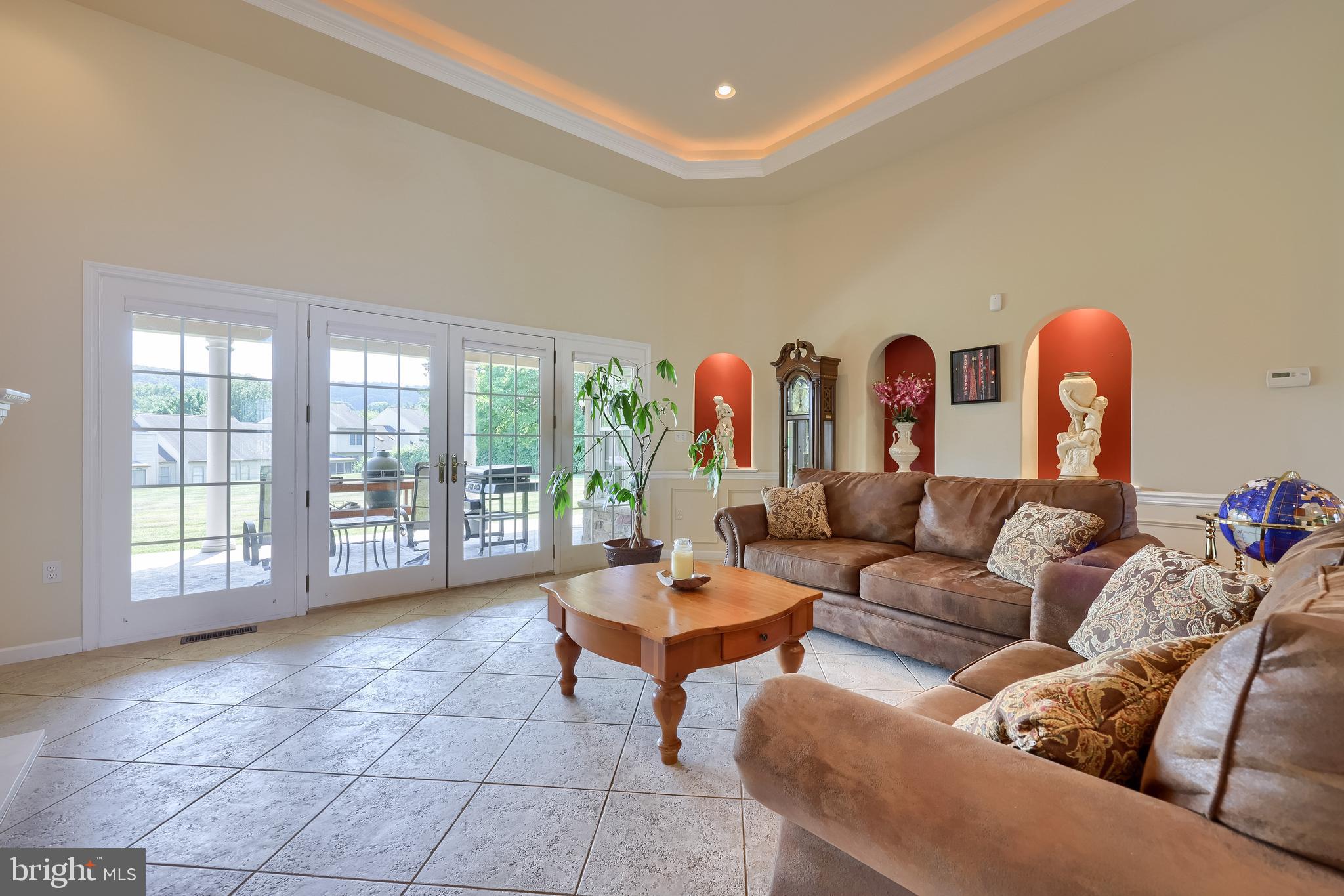890 Fishburn Road Hershey, PA 17033 - Photo 34 of 103 a living room with furniture and a floor to ceiling window