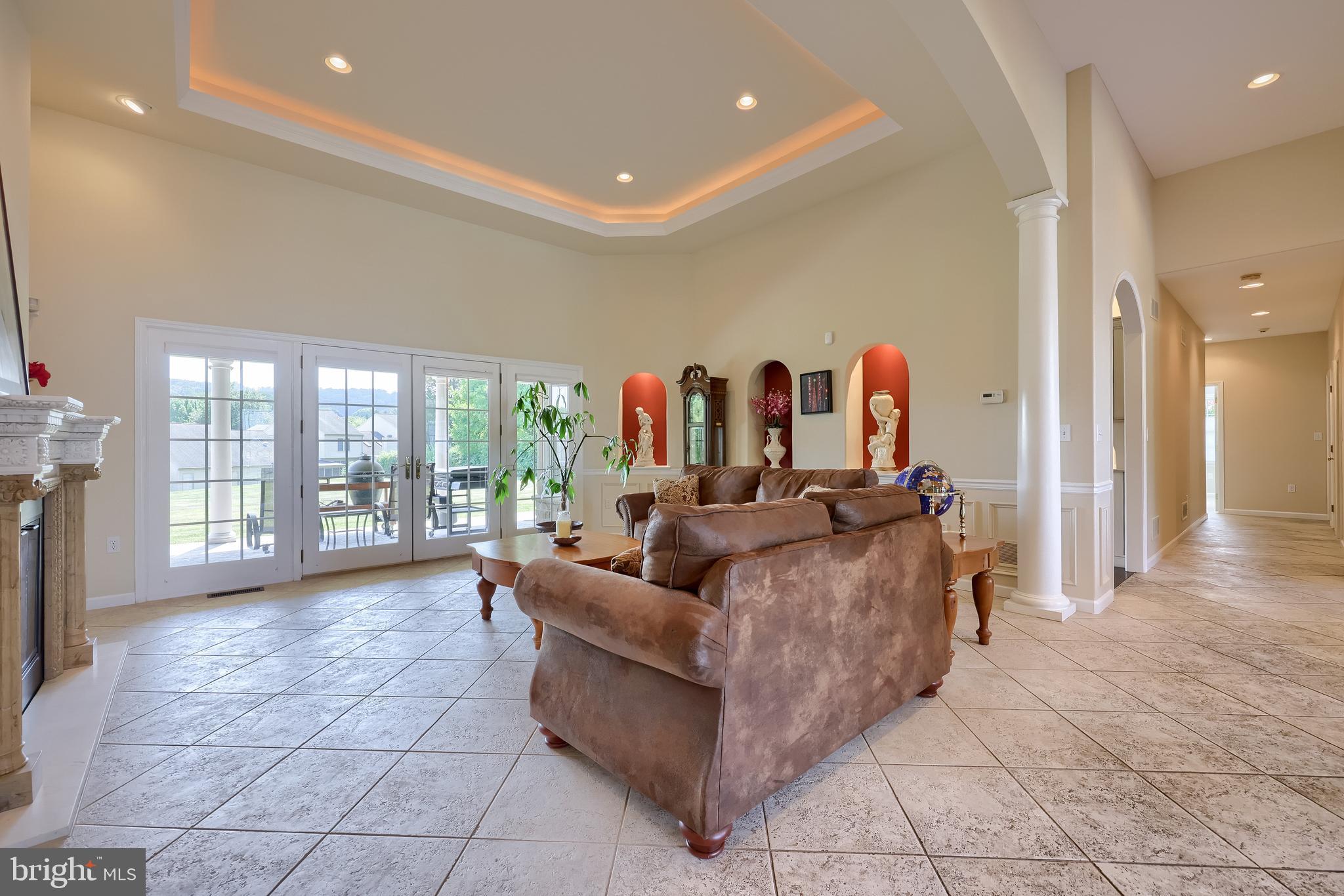 890 Fishburn Road Hershey, PA 17033 - Photo 35 of 103 a living room with furniture and a floor to ceiling window