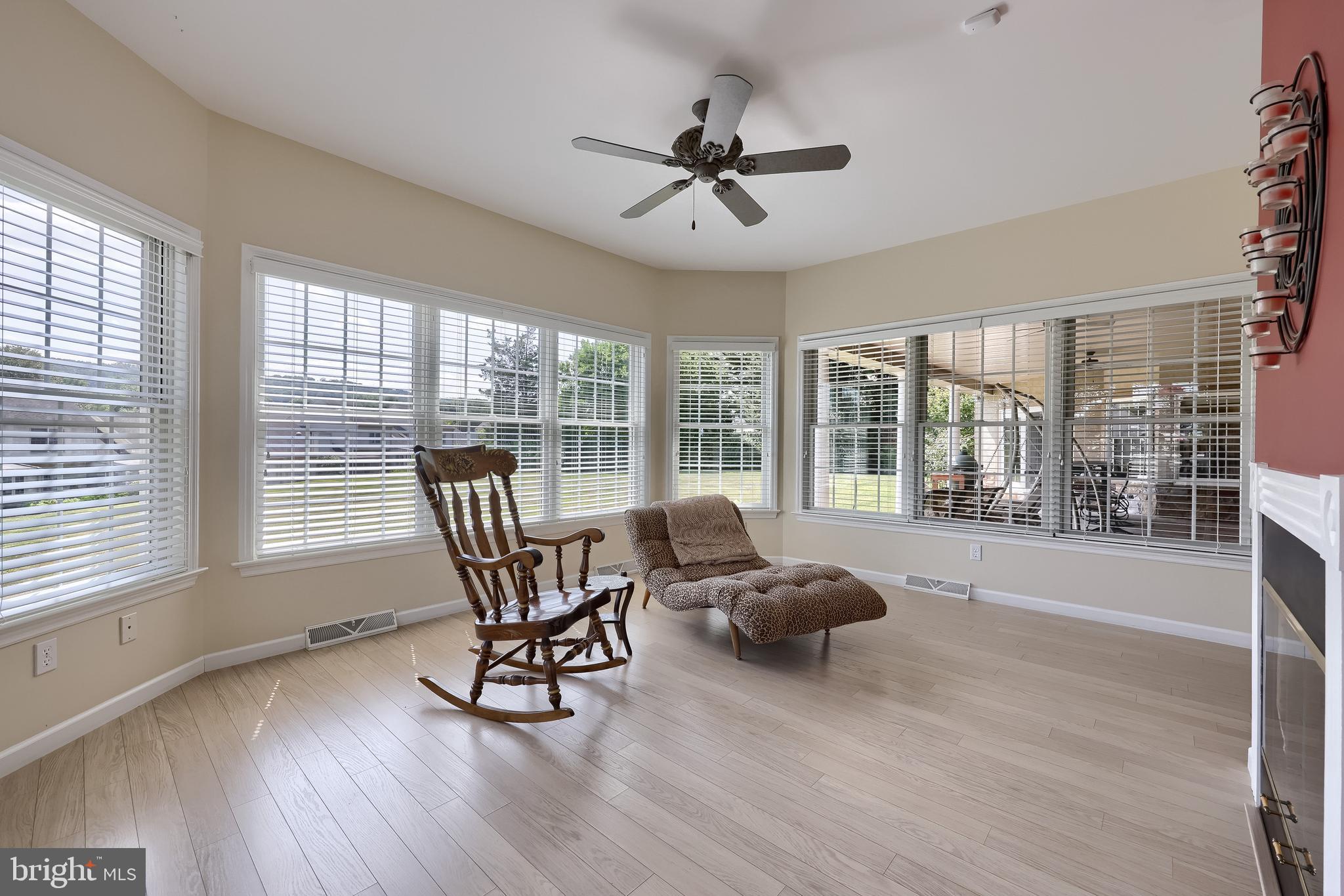890 Fishburn Road Hershey, PA 17033 - Photo 45 of 103 a living room with furniture and a large window with wooden floor