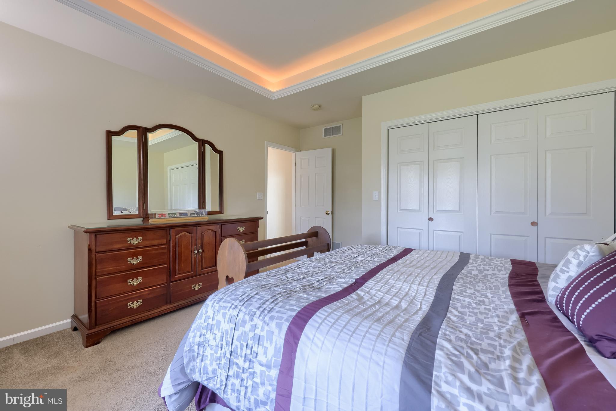 890 Fishburn Road Hershey, PA 17033 - Photo 59 of 103 a bedroom with a bed and a dresser