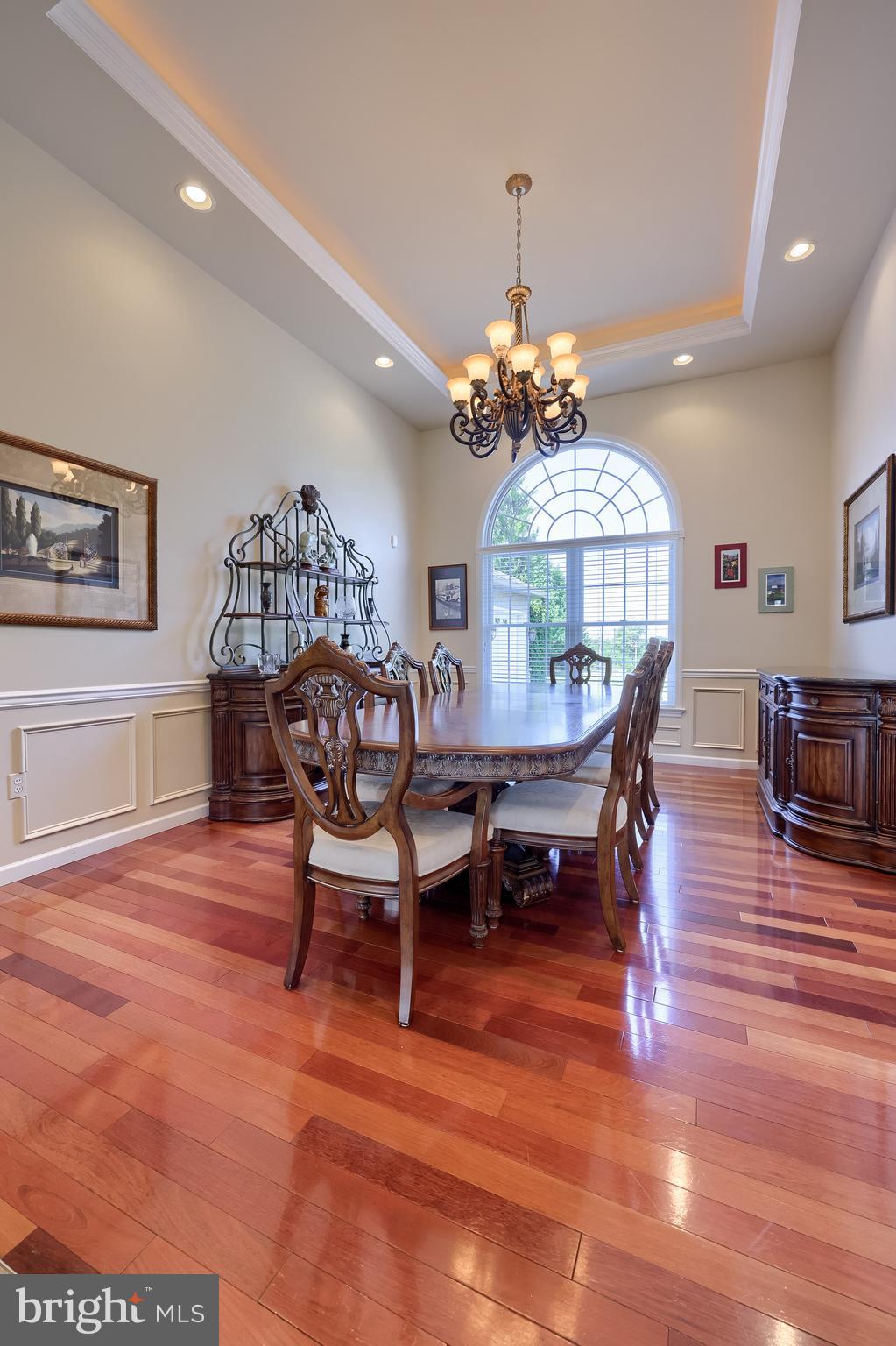 890 Fishburn Road Hershey, PA 17033 - Photo 6 of 103 a view of a dining room with furniture a chandelier and wooden floor