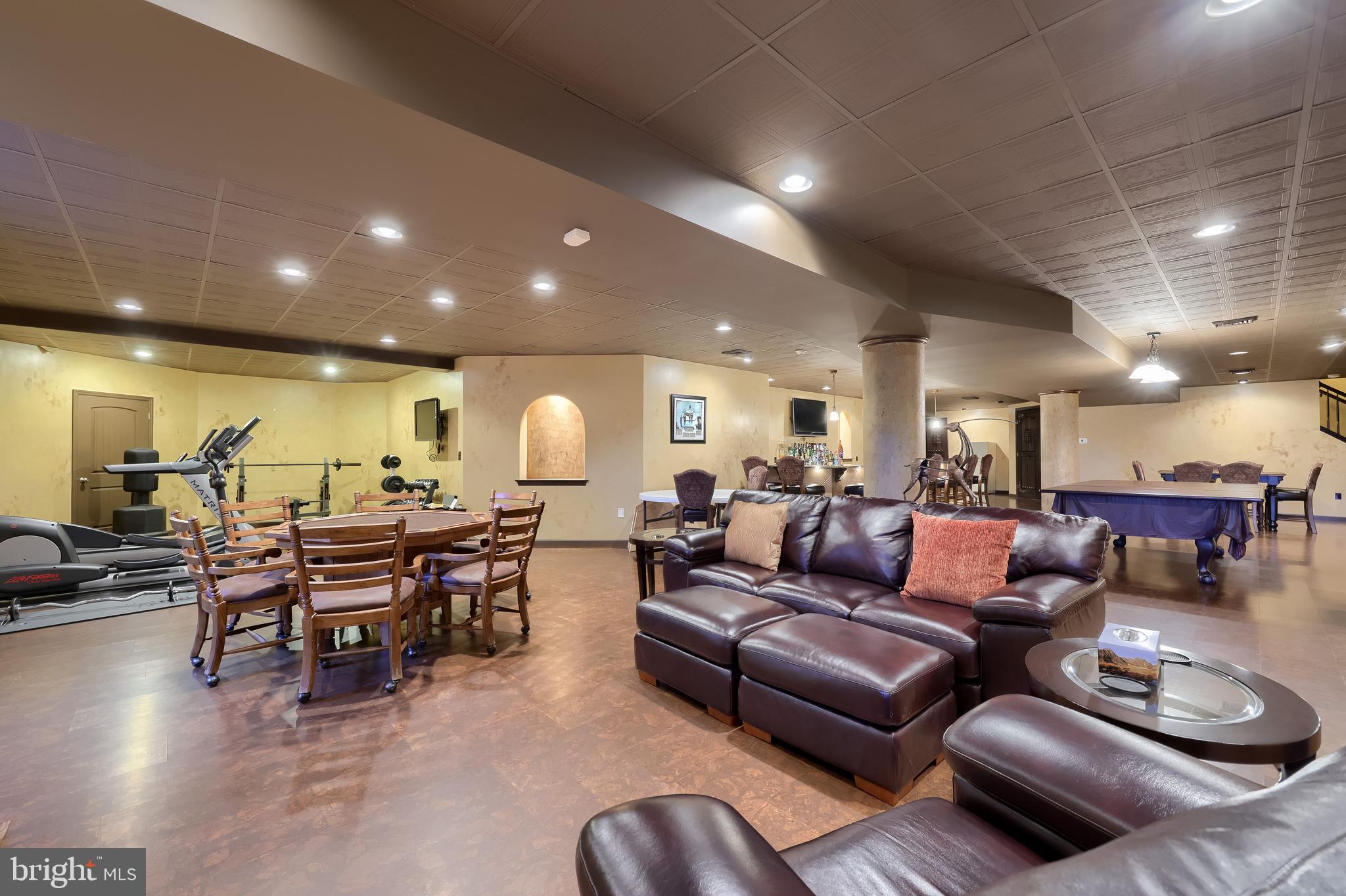 890 Fishburn Road Hershey, PA 17033 - Photo 71 of 103 a living room with furniture kitchen view and a wooden floor