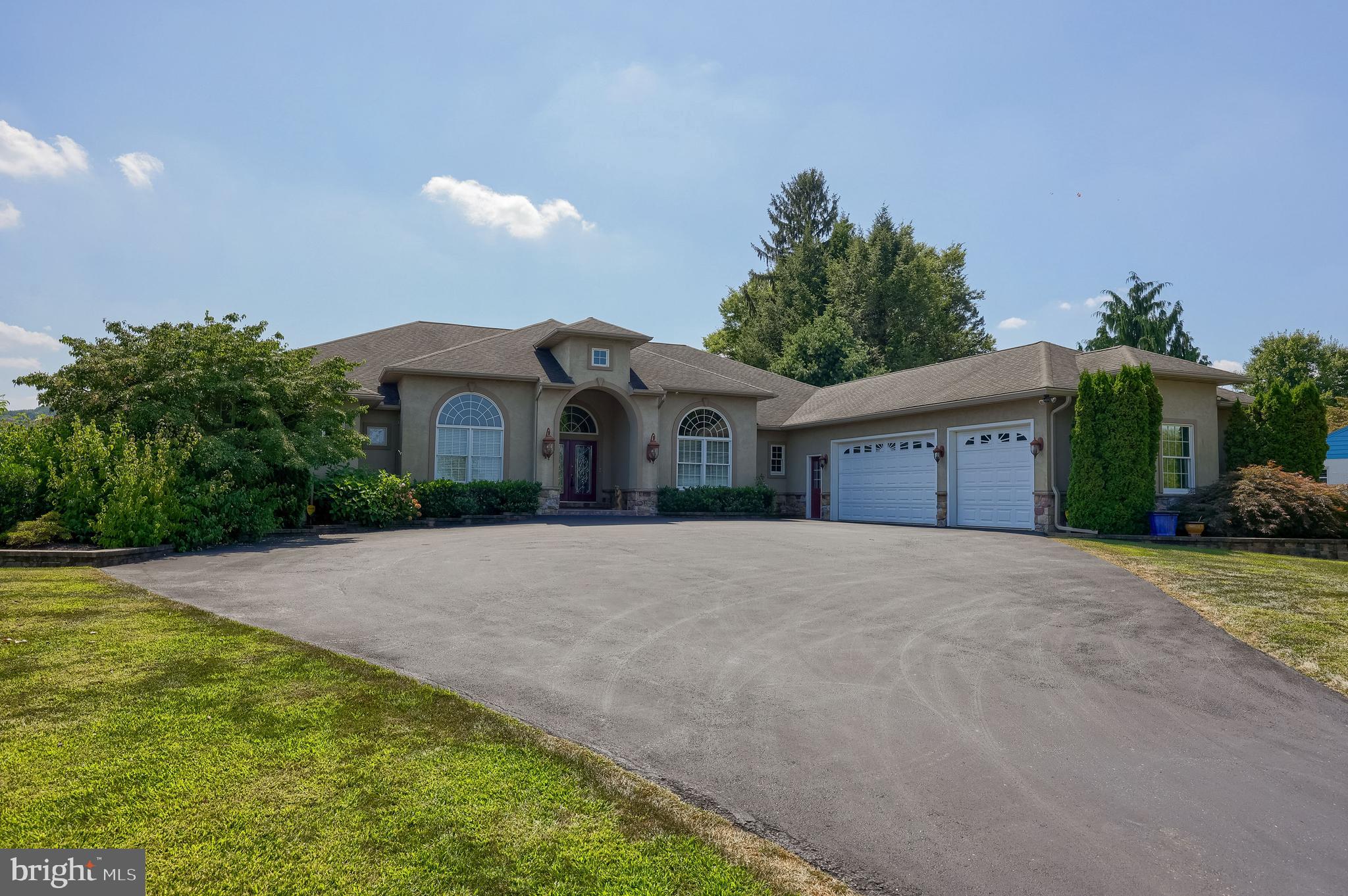 890 Fishburn Road Hershey, PA 17033 - Photo 94 of 103 a front view of house with yard and trees in the background