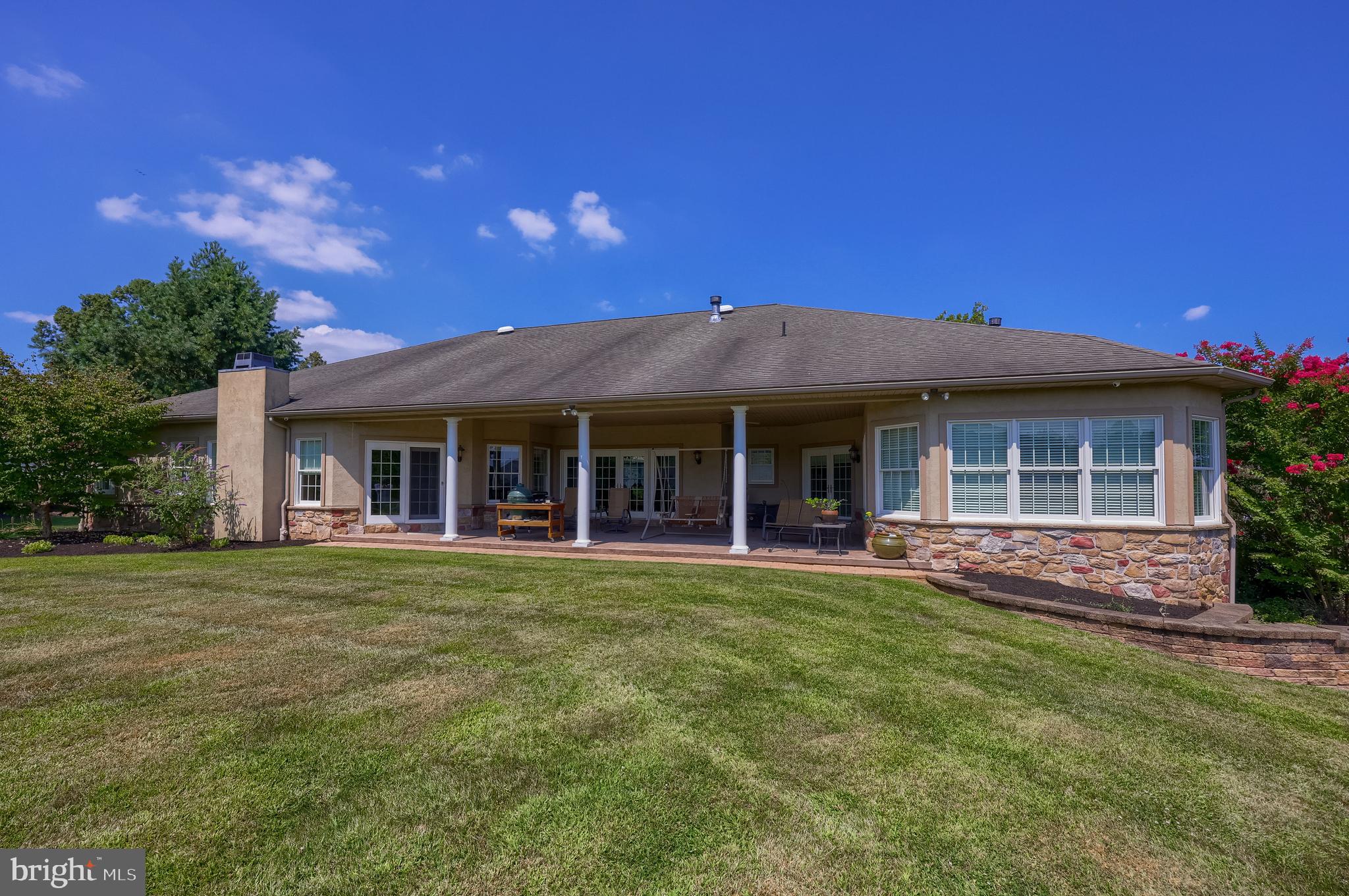 890 Fishburn Road Hershey, PA 17033 - Photo 97 of 103 a front view of a house with a garden and patio