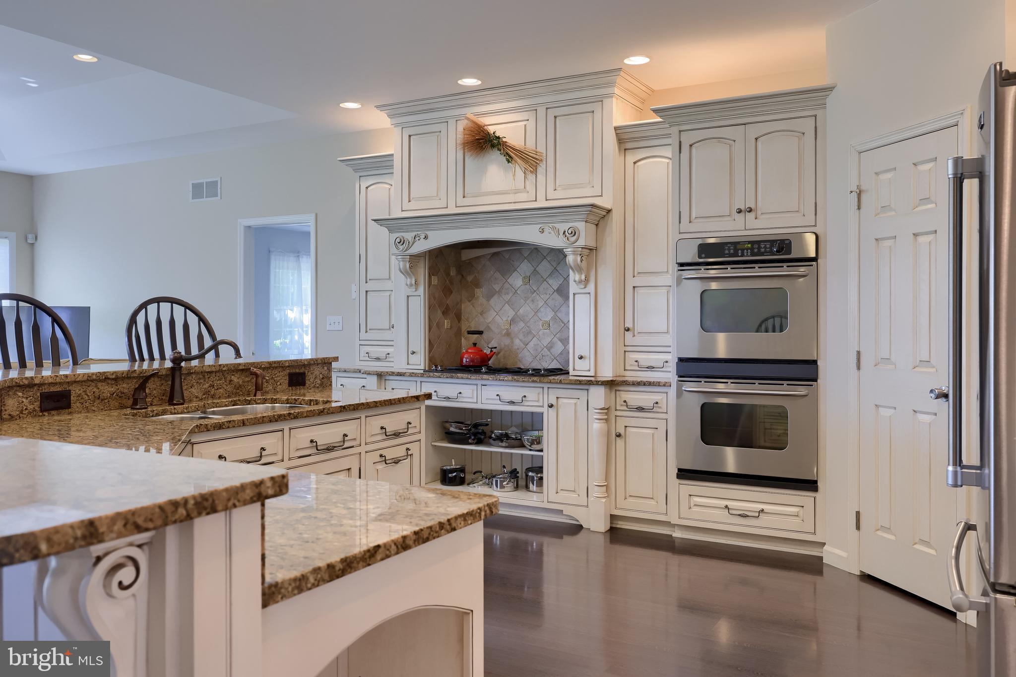 890 Fishburn Road Hershey, PA 17033 - Photo 10 of 103 a kitchen with stainless steel appliances granite countertop a stove a sink and a refrigerator