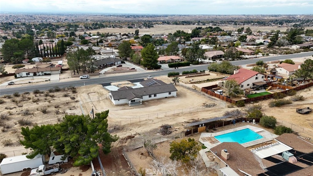 14685 Apple Valley Road Apple Valley, CA 92307 - Photo 8 of 29 an aerial view of residential houses with outdoor space
