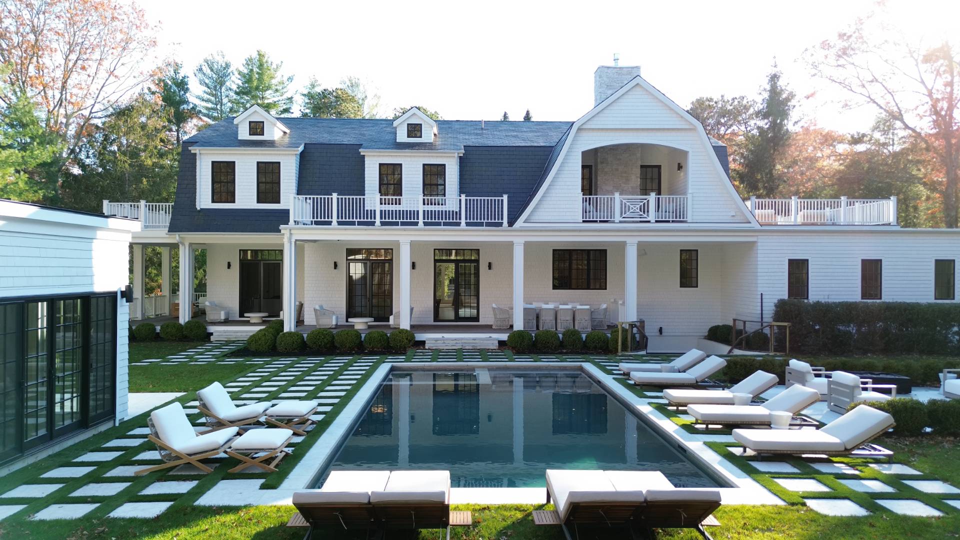a front view of house with yard outdoor seating and barbeque oven