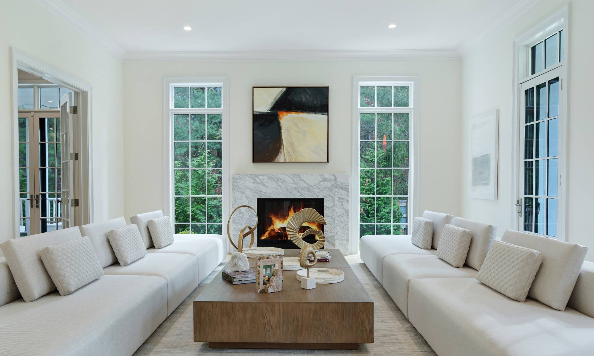 73 Wainscott Stone Road Wainscott, NY 11975 - Photo 11 of 27 a living room with furniture and a fireplace