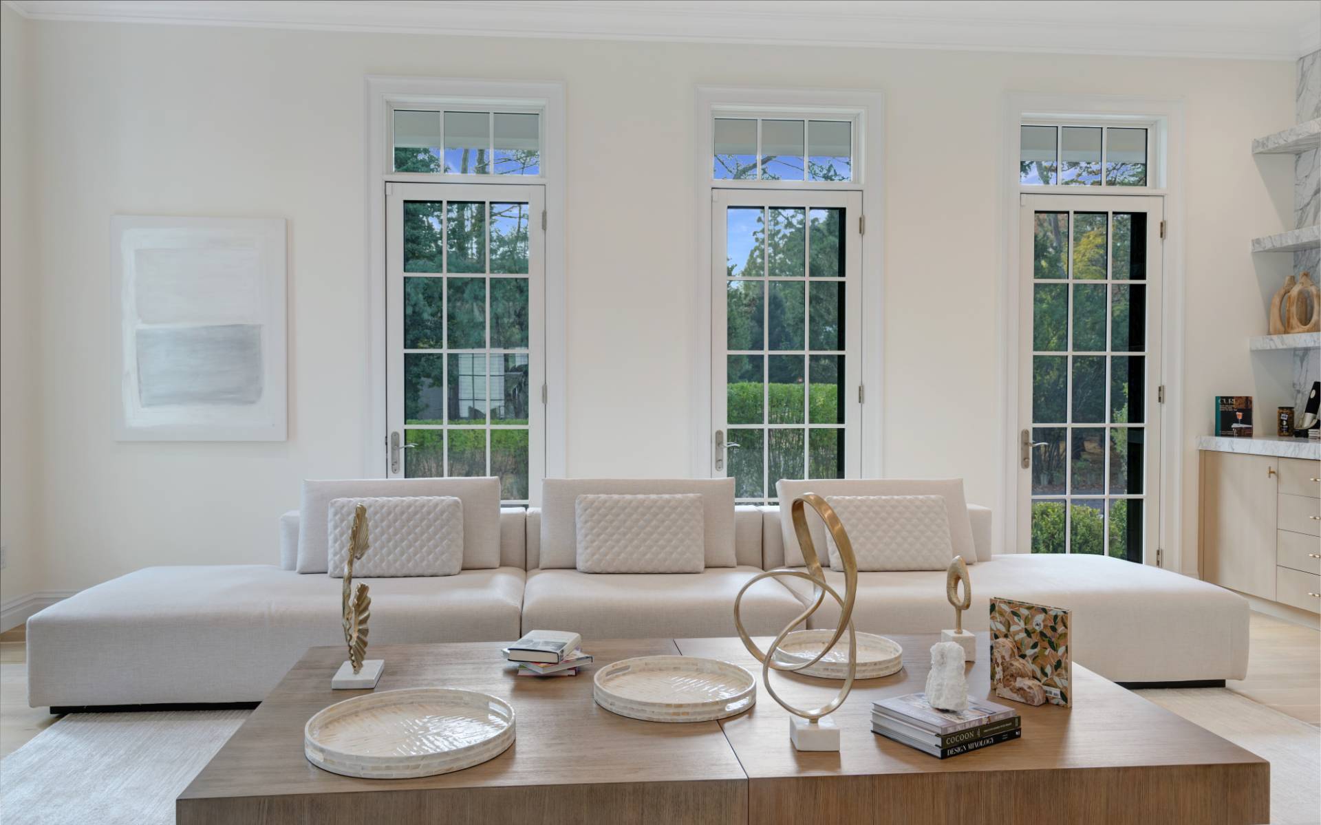 73 Wainscott Stone Road Wainscott, NY 11975 - Photo 15 of 27 a living room with furniture and a large window