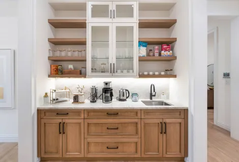 a kitchen with refrigerator and window