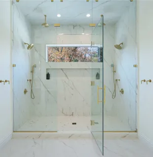 a bathroom with a sink vanity and mirror