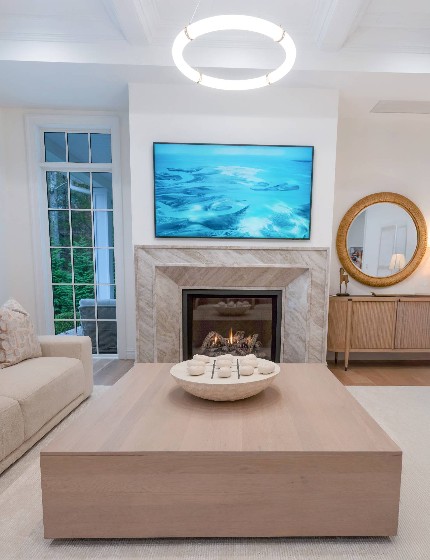 73 Wainscott Stone Road Wainscott, NY 11975 - Photo 8 of 27 a living room with furniture and a fireplace