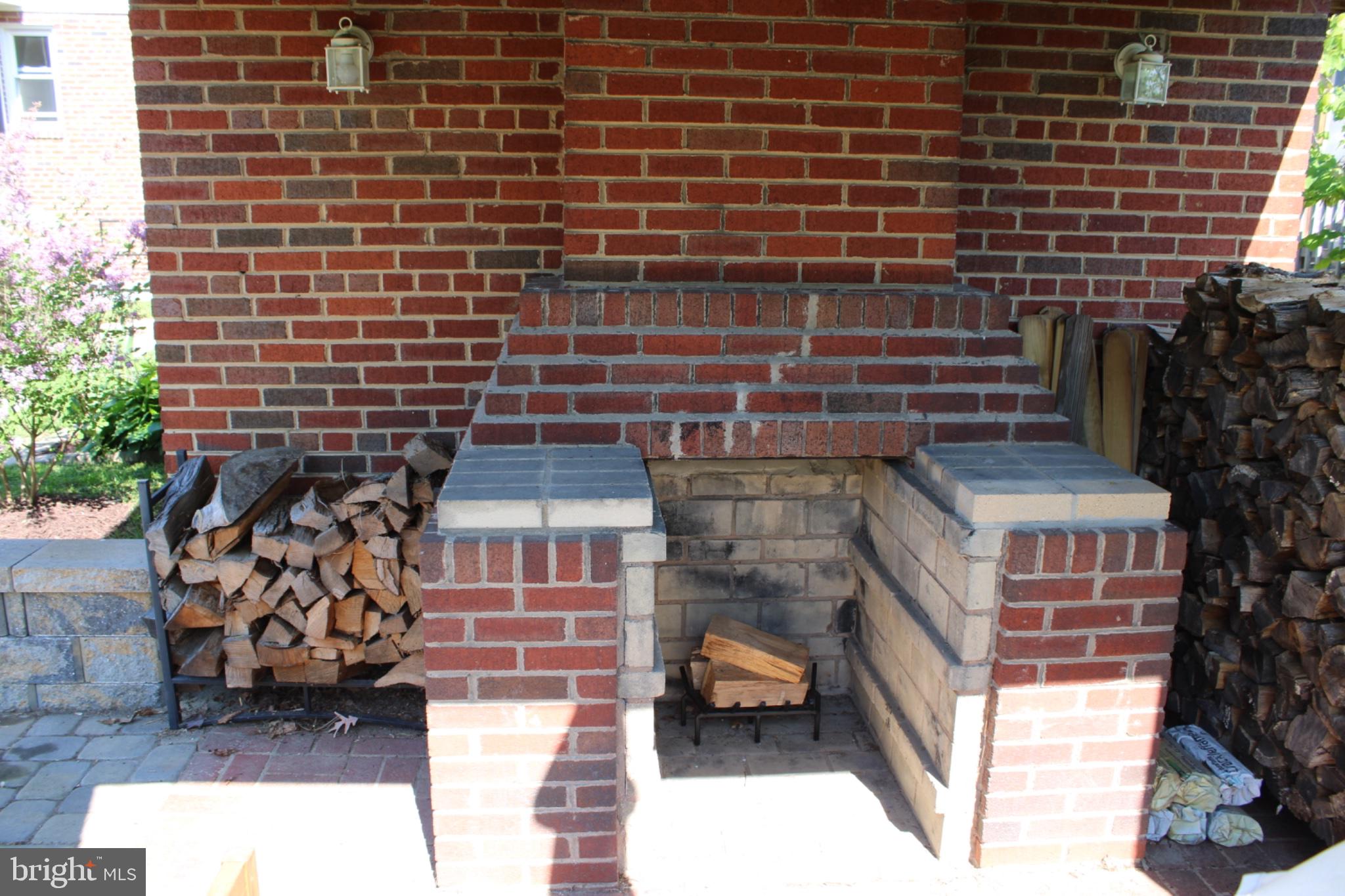 4014 32nd Street Mount Rainier, MD 20712 - Photo 8 of 9 Charming outdoor brick fireplace nook.