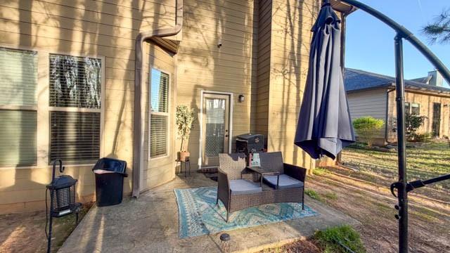 250 Sylvan Loop Fayetteville, GA 30214 - Photo 17 of 18 a living room with furniture and large windows