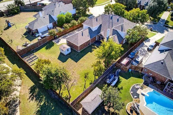 an aerial view of a city with lots of residential buildings