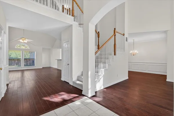 a view of entryway with wooden floor