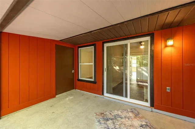 a view of a room with a large window