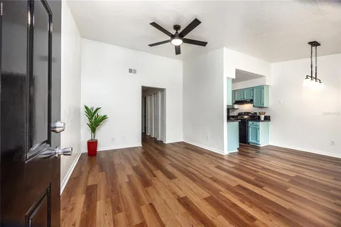 a view of a livingroom with a flat screen tv