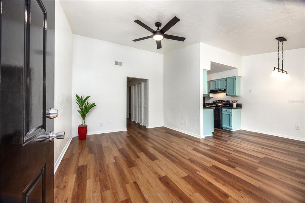 6708 Southwest 45th Avenue Gainesville, FL 32608 - Photo 4 of 40 a view of a livingroom with a flat screen tv