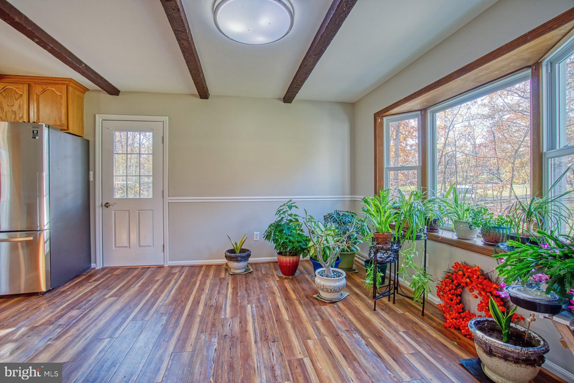 19822 Smith Circle Ashburn, VA 20147 - Photo 15 of 52 Impressive Bay Window in Dining Room