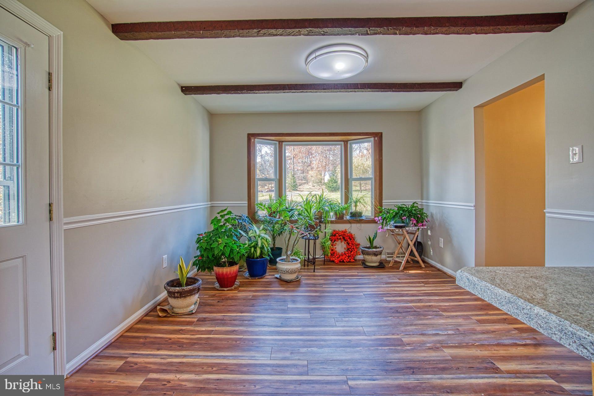 19822 Smith Circle Ashburn, VA 20147 - Photo 16 of 52 Dining Room Off Kitchen