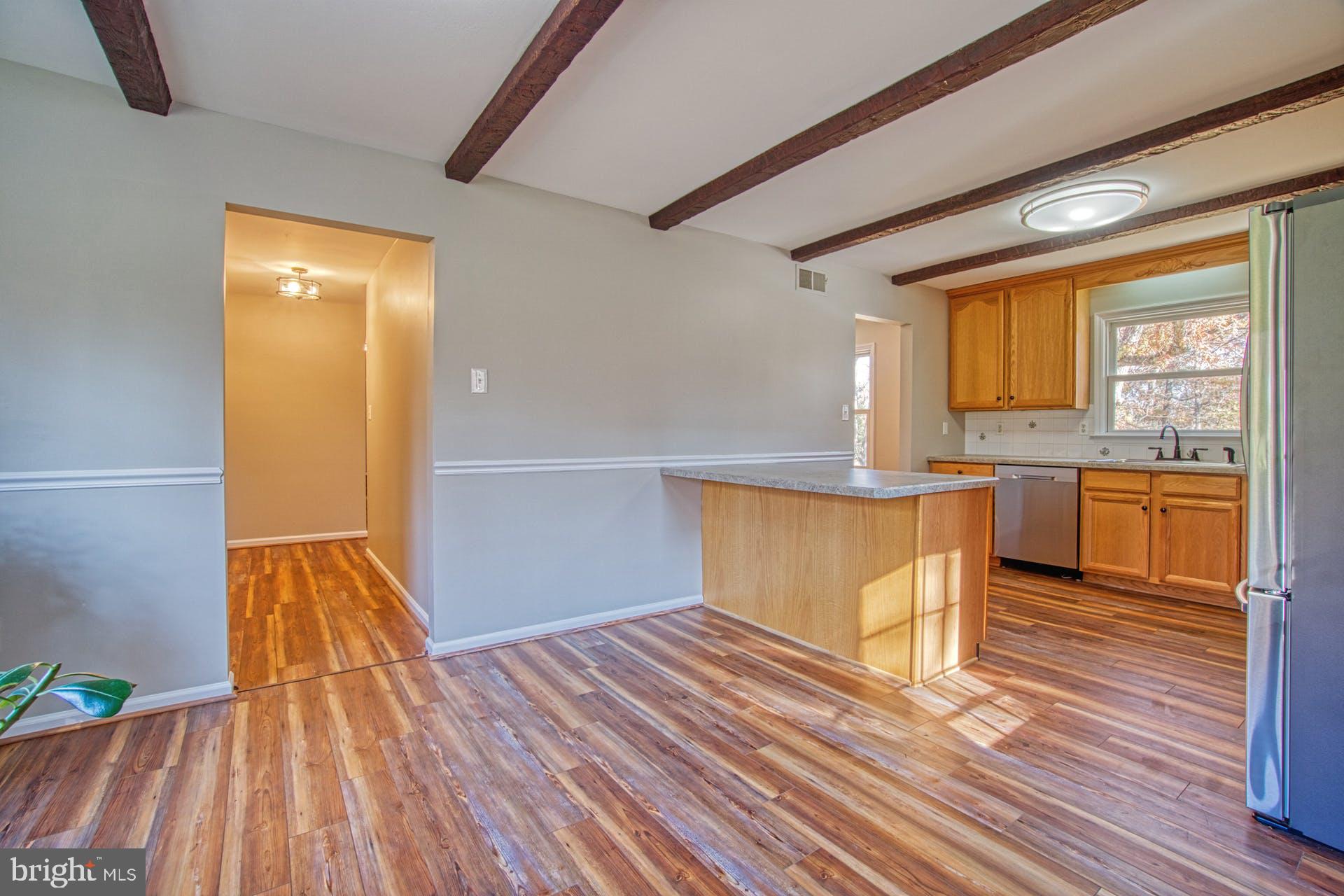 19822 Smith Circle Ashburn, VA 20147 - Photo 17 of 52 Beautiful Beamed Ceilings!