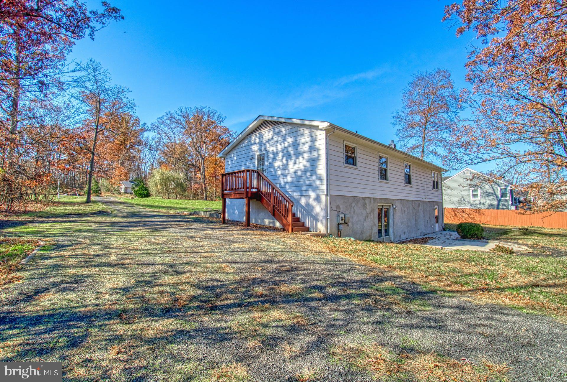 19822 Smith Circle Ashburn, VA 20147 - Photo 28 of 52 Side Porch with Stairs Down