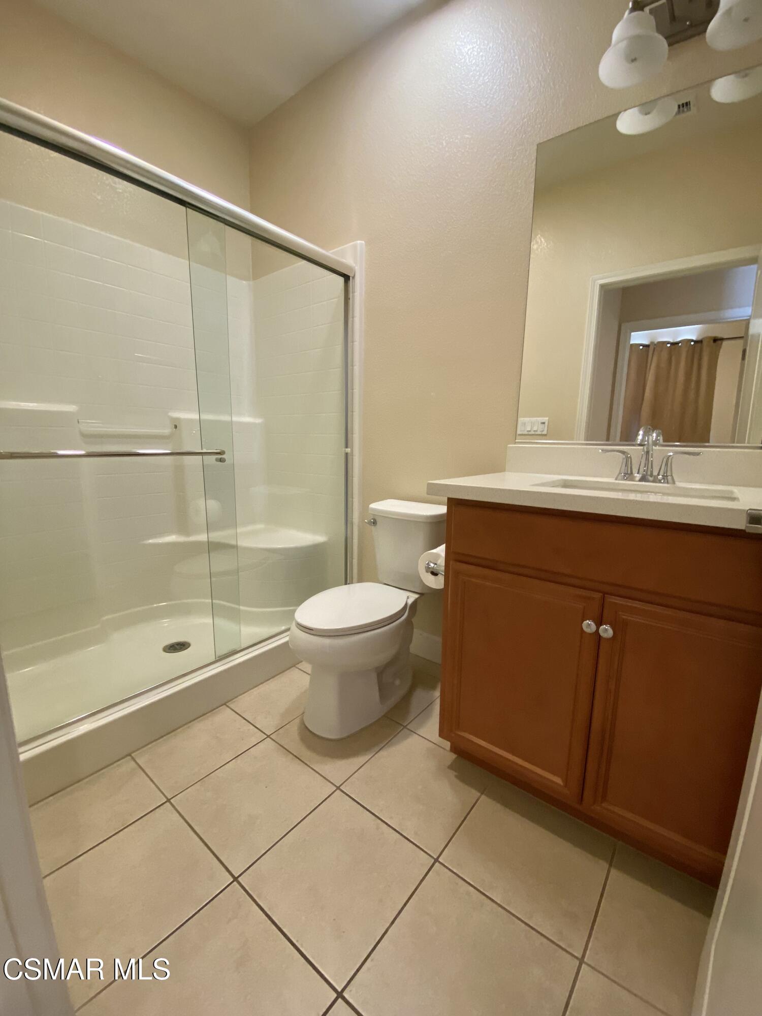7085 Crozet Avenue Moorpark, CA 93021 - Photo 7 of 22 a bathroom with a sink a toilet and shower