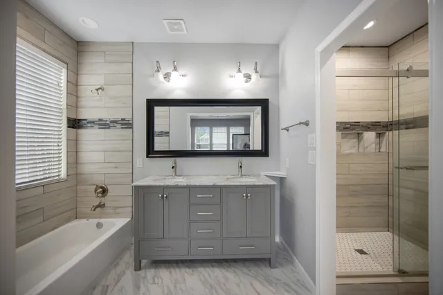 a bed room with furniture and a baby crib