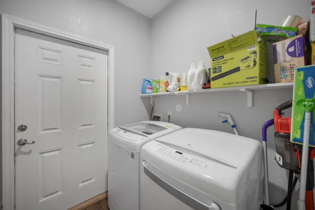 a view of a park with swings and slides